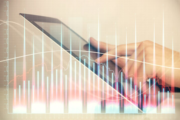 Poster - Multi exposure of man's hands holding and using a digital phone and forex graph drawing. Financial market concept.