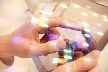 Poster - Multi exposure of man's hand holding and using a digital device and data theme drawing. Innovation concept.