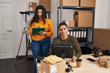 Poster - Man and woman ecommerce business workers working at ecommerce office