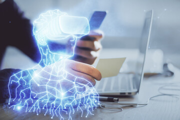 Poster - Double exposure of man's hands holding and using a digital device and AR glasses drawing. Virtual reality concept.