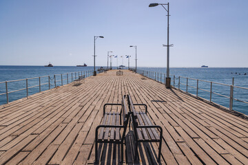 Wall Mural - Tourists pier in Molos sea front park of Limassol city in Cyprus island country