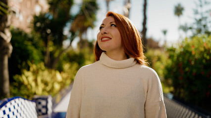 Sticker - Young redhead woman smiling confident standing at park