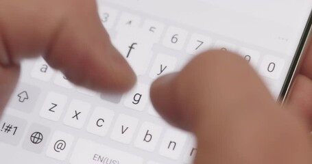 Man typing a text message on his smartphone. Hand of man typing or chat