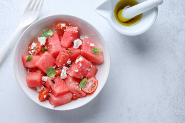 Sticker - Watermelon salad with cheese served on plate