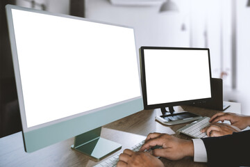 Wall Mural - A businessman is working on a mock-up. Using a laptop with a blank copy space screen for your advertising text message computer