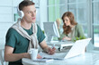 © aletia2011 - young man and woman working in office