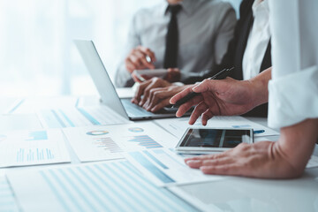 asian businessmen and investors brainstorm applications for web design planning and develop template
