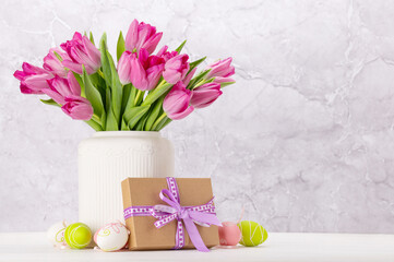 Wall Mural - Fresh pink tulip flowers and easter eggs