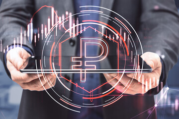 Poster - Close up of businessman hand holding digital pad with downward red ruble candlestick chart on blurry office interior background. Financial crisis and recession concept. Double exposure.