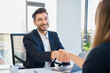 © Westend61 - Happy recruiter shaking hand with candidate after interview at office