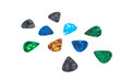 Plastic picks of different colors for playing acoustic or electric guitar.