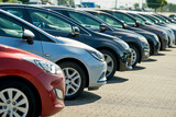 Fototapeta Kawa jest smaczna - row of used cars. Rental or automobile sale services