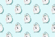 Seamless pattern of white alarm clocks on bright light blue background. Conceptual sunlight background.