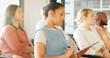© Nina L/peopleimages.com - Conference, audience and tablet of business people in presentation, workshop or seminar for training, innovation and digital startup. Young future employees listening at an internship career meeting
