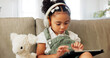 © Kirsten D/peopleimages.com - Tablet game, headphones and relax child gaming, having fun or play online games on mobile device or digital tech app. Kid entertainment, youth lifestyle and young gamer girl playing on ui touchscreen