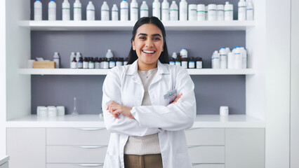 Poster - Portrait of a female scientist using a microscope in a research lab. Young biologist or biotechnology researcher working and analyzing microscopic samples with the latest laboratory tech equipment