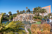 An Artificial Waterfall And Pool With Palm Trees Next To The Mirage Hotel And Casino On The Strip In Las Vegas, Nevada.