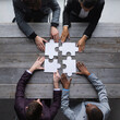 © alotofpeople - Business teamwork with puzzle