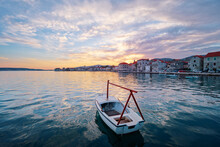 Beautiful Sunset Landscape. Fishing Boat Moored On Kastel Coast In Dalmatia,Croatia.Old Town Near Adriatic Sea.