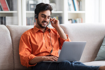 Wall Mural - Handsome middle eastern man project manager working from home