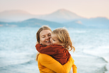 mother hugging with child daughter family lifestyle happy emotions travel together summer vacations 
