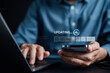 © Kiattisak - Update software system in computer. Man using smartphone upgrade program, Business technology internet loading virtual bar with installing the update for the quality better...