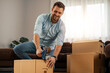 © ivanko80 - Young man packing order for shipping to customer