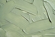 © azurita - Green cosmetic clay texture close up. Cosmetics texture mask clay for face and body