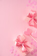 © Denira - Candy pink lollipops with red gift box on pink background