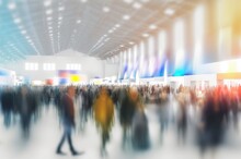 Background Of An Expo With Blurred Individuals In An Exposition Hall. Concept For A Major International Exhibition, Conference Center, Corporate Marketing, And Event Fair. Generative AI