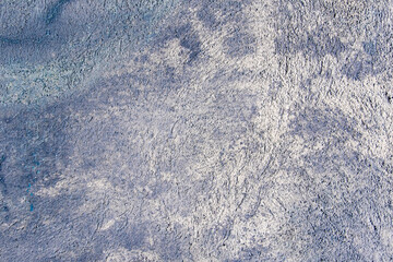 Wall Mural - Blue and white stained concrete wall background texture