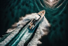Aerial Shot Of A Luxurious Motorboat. People Are Traveling In A White Speedboat On Blue Water While The Sun Is Shining. High Speed Aerial View Of A Speed Boat. Generative AI