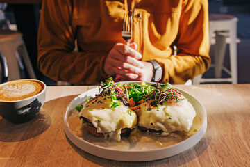 Unrecognizable man going to eat the brunch.