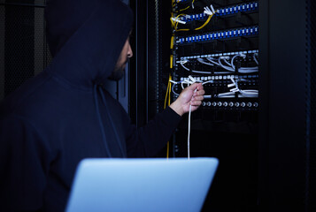 Leinwandbilder - Thief, programming and hacker stealing software, website data and information on server on a laptop. Connection, criminal and man hacking into a network for hardware, coding and cyber crime at night