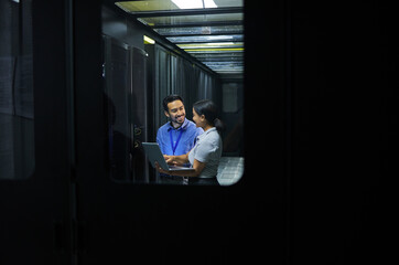 Sticker - Man, woman or laptop in server room, IT engineering or software programming for cybersecurity, analytics or database safety. Smile, happy or data center people on technology in teamwork collaboration