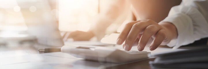 Business Professional Chartered Accountant Woman working with computer and calculator Sales Invoice Accounting