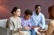 © Seventyfour - Family Discussing Problems with Psychologist