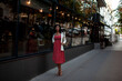 © Вероника Зеленина - A beautiful girl with a long brown hair of 35 walks around the city