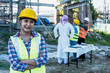 © Jack Tamrong - Engineer Construction woman at construction site with arab businessman and builder men background
