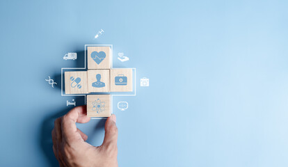 Wall Mural - Health insurance concept. people hands putting plus symbol and healthcare medical wooden cube block with icon, health and access to welfare health concept