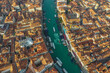 Aerial view of boats sailing along the Grand Canal in Venice downtown, Veneto, Italy.