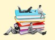 © BillionPhotos.com - Happy group of young university students on big book