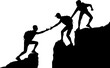 The silhouette of two climbers in the mountains helps another climber overcome an obstacle. Business concept of teamwork