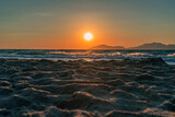 Fototapeta Desenie - Grecka plaża o zachodzie słońca