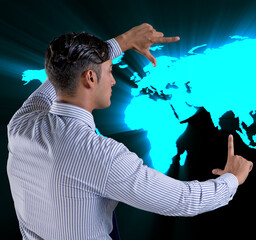 Wall Mural - Businessman pressing virtual buttons in global business concept