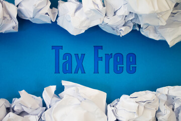 Poster - Tax Free text with Torn, Crumpled White Paper on colored background.