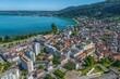 Vorarlbergs Bezirkshauptstadt Bregenz im Luftbild - Ausblick auf die Innenstadt und den Hafen am Bodensee