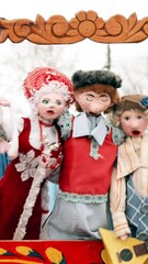 Wall Mural - vertical footage Vertep. Puppet Theatre In Ukraine And Belarus. In Belarusian Culture It Was Also Referred To As Batleika. Celebration Eastern Slavic National Traditional Holiday Maslenitsa.