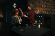 © Nomad_Soul - Old mature witch sorceress holding magic ritual for young woman