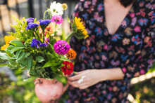 Gorgeous Summer Flowers Held By Woman In Garden